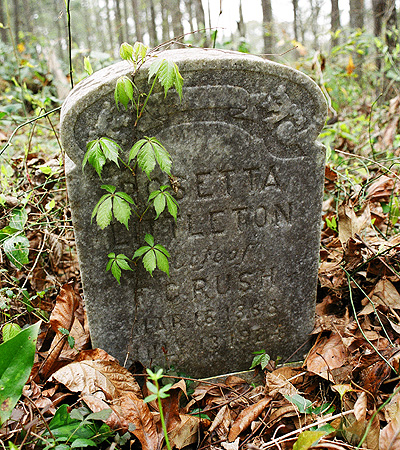 A closer look at one of the graves reveals a name that's always been special to me.  (2005)