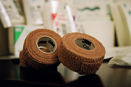 A couple rolls of medical tape painstakingly posed in the conference room at Marble Medical, Inc.  No flash, long exposure, natural lighting, blah, blah, blah.  (2004)