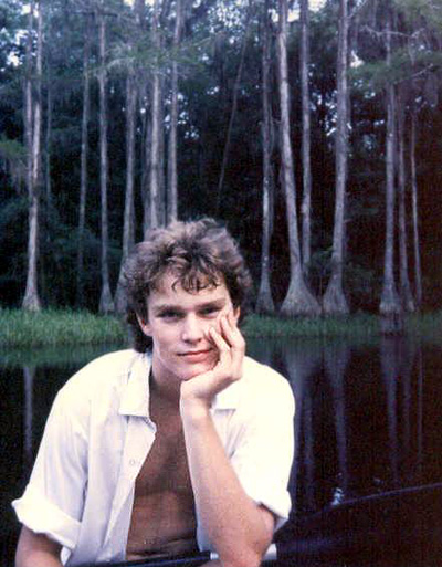 Your friend and author sitting in a canoe at Lake Bradford.  I'm guessing I was 17 or 18 at the time and my friend, Julie, was wielding the camera.  (1986)