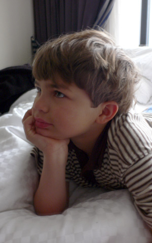 Alex waiting patiently in the hotel before we left for the aquarium.