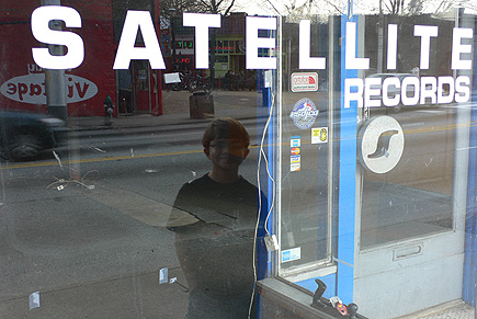 The light from Alex bouncing off the window of a favorite record store (now de-funked) in Little Five Points.