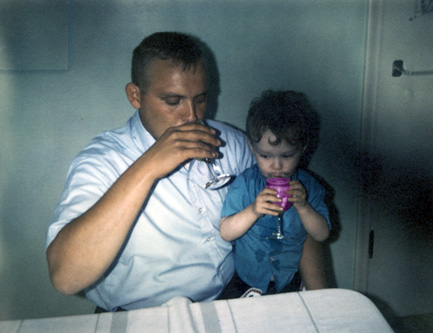 Me and my dad drinking a while ago.  Click below for larger, original image.  (1971)