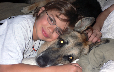 Nephew Alex with Sheriff.  In the bed.  With Aunt Candy's hand. (2007)