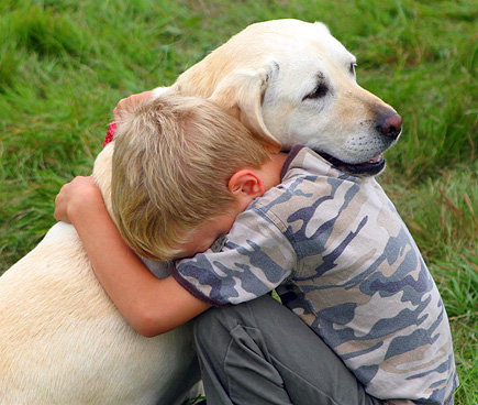 Caption: “This kid had his dog entered in a local dog show and he was wishing her luck ;-)”  (2006)
