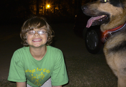 Alex and Argus at The Greenway at night.  Streetlight in distance.  (2007)