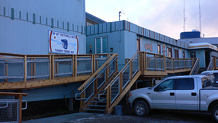 Outside the Top of the World hotel.  Pepe's North of the Border is next door, sharing the stairs and outside catwalk.  (2007)