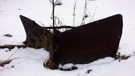 Old plow near the barn.  (2007)