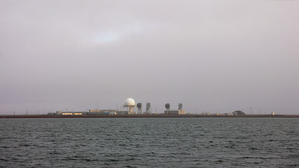 The United States Air Force Long Range Radar Site in Barrow, Alaska.  From across the water on our way back from Point Barrow.  (2007)