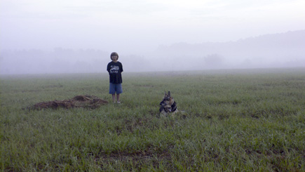 Alex and Sheriff at The Lake Bottom surrounded by the early Sunday morning fog.  (2008)