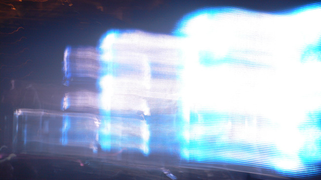 Blue waves caused by leaving the shutter open too long and waving the camera in a creative fashion during the Nine Inch Nails concert in Jacksonville.  (2008)