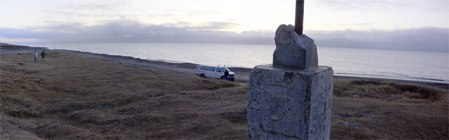 Multiple photos stitched together to create a panoramic mosaic of the Wiley Post monument about ten miles west of Barrow, Alaska.  (2007)