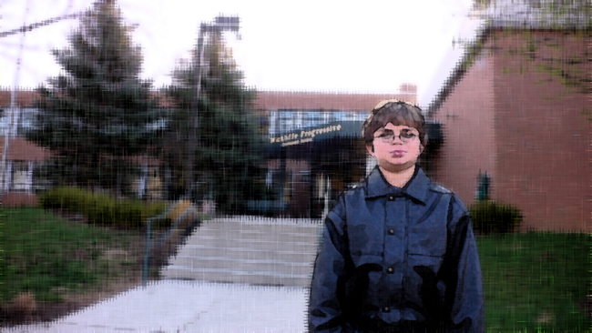 Alex in front of his school, Wickliffe Progressive Elementary School, in Columbus, Ohio.  (2009)