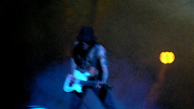 Photoshop helped me create this faux watercolor of Dave Navarro from Jane's Addiction doing his guitar thing at the NIN|JA show in Tampa on May 9th, 2009.  (2009)