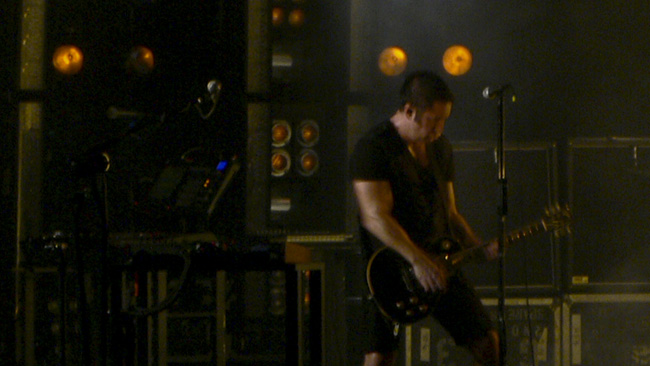 A successful demonstration of how the digital zoom on my camera can work for me.  Trent Reznor rocking out on stage in Tampa on May 9th, 2009.  (2009)