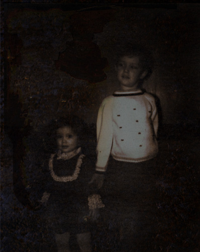 Shannon and I from long ago.  (Year Unknown)  I used Photoshop to further malign the image to make it appear as if it was found on an old decaying photographic plate from back in the days when cameras were beasts.